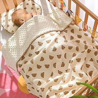 Endormit dans un berceau muni de sa Couverture bebe