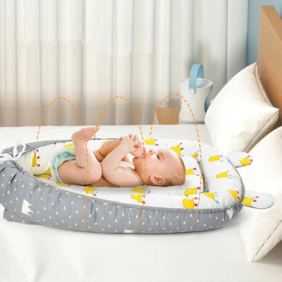 Nid d ange bebe en joie