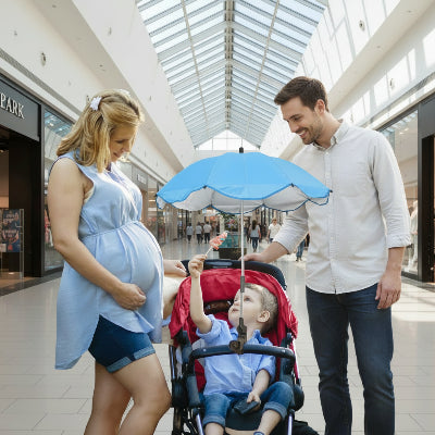 Ombrelle pour poussette promenade familliale sereine
