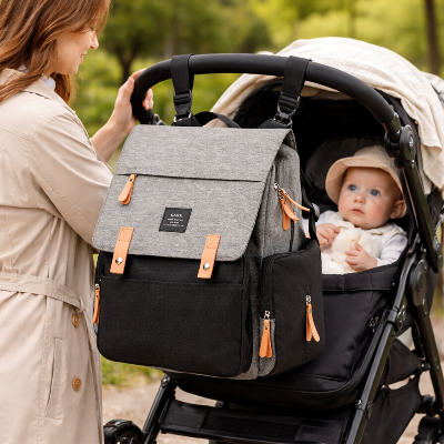 Sac a dos maternite pour couches attacher a la poussette