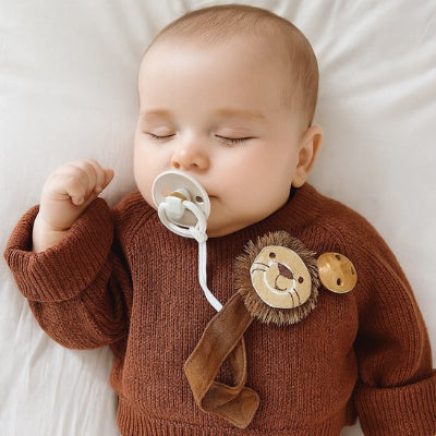 Attache tetine bébé en paix heureux