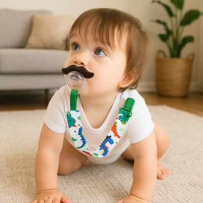 Attache tetine motif dinausor bébé content