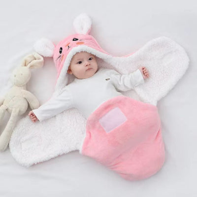 bebe dans un nid dange lapin