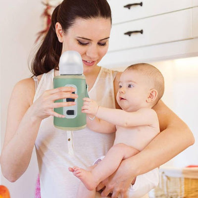 Maman bebe satisfait de Chauffe biberon nomade