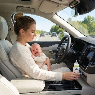 maman utilise chauffe biberon voiture car bebe a faim