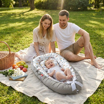 nid d ange bebe à famille en pique nique